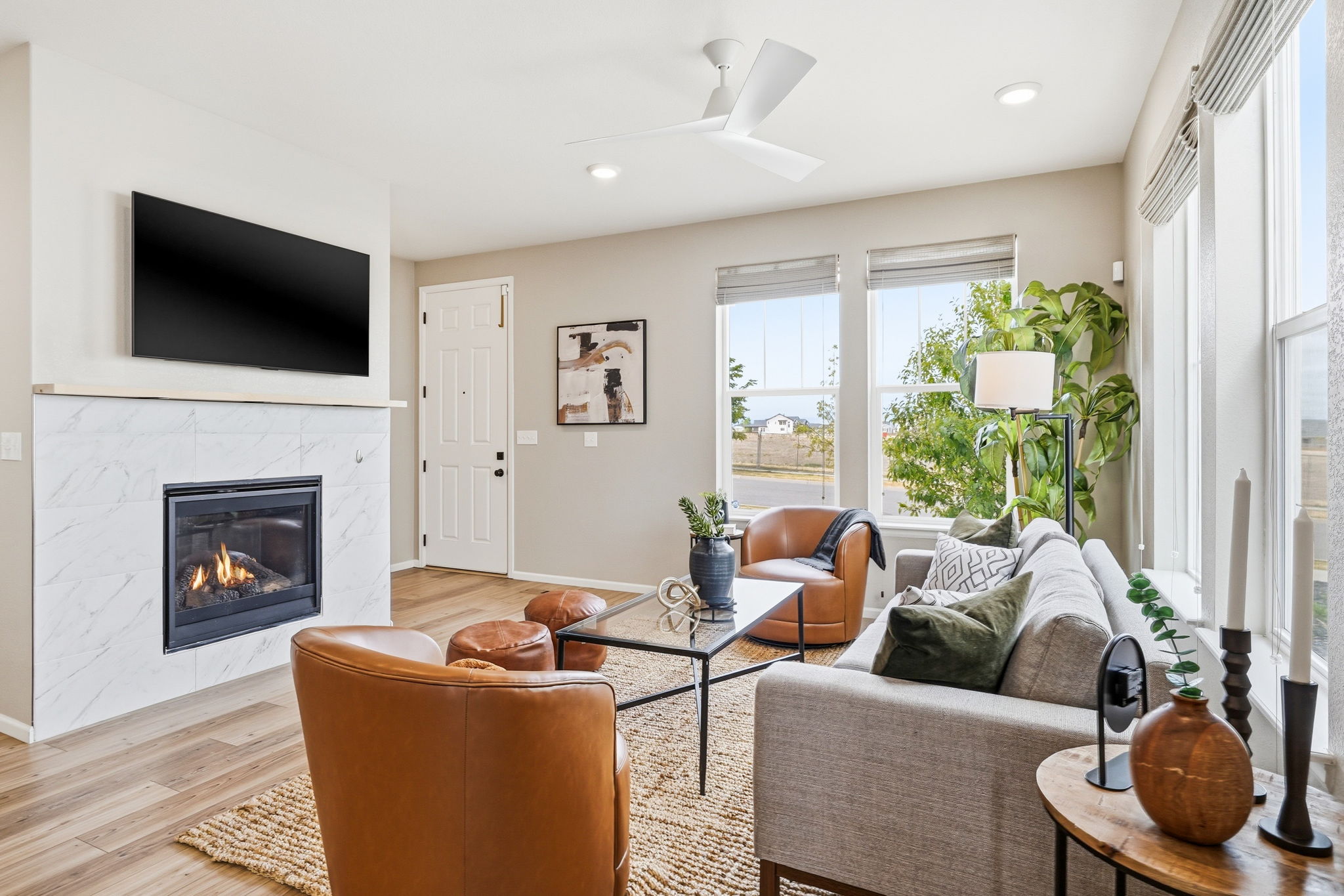 light filled living room with fireplace Colliers Hill home for sale