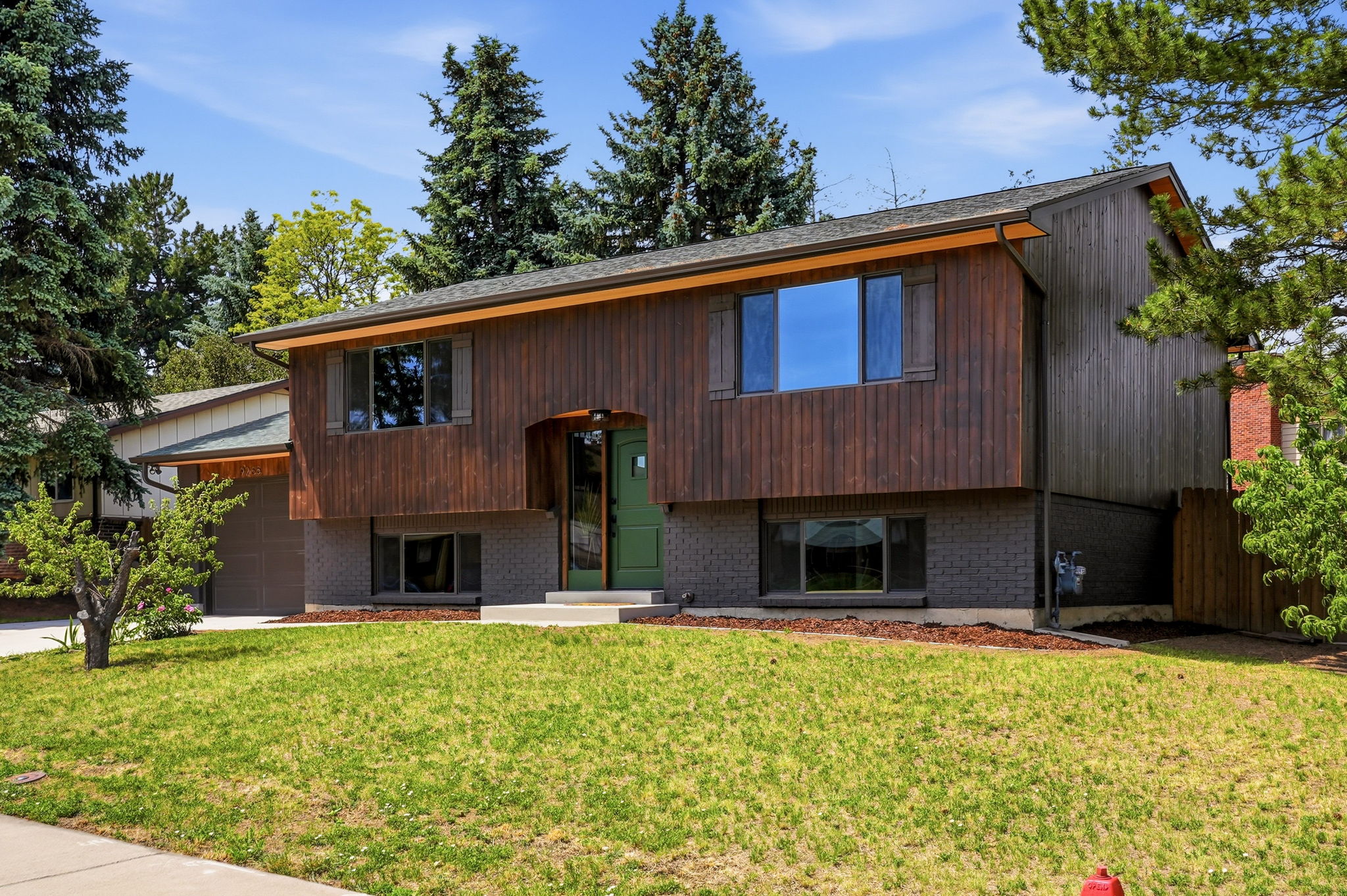 9265 Raleigh Street Westminster CO home for sale in Sunset Ridge featuring updated exterior, large lot, and remodeled bi-level design